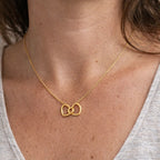 Collar doble corazón dorado
