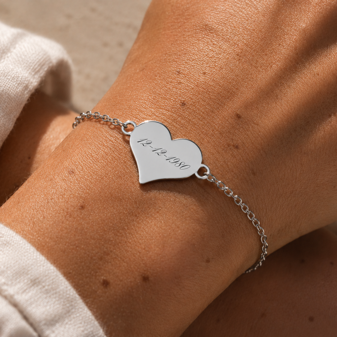 Pulsera corazón plateado