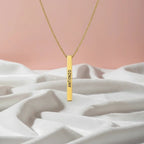 Collar obelisco dorado
