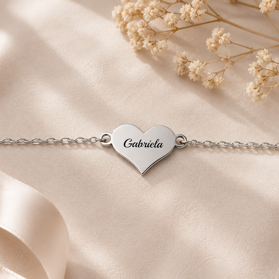 Pulsera corazón plateado